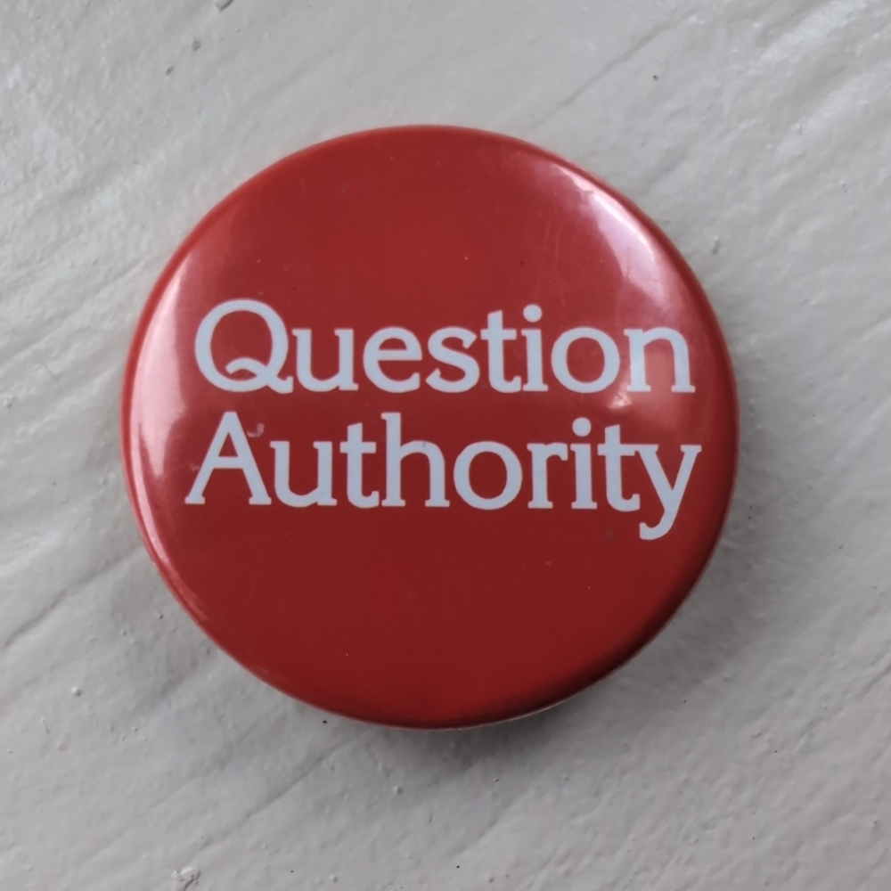 Vintage red "Question Authority" 1.5 inch pin back button